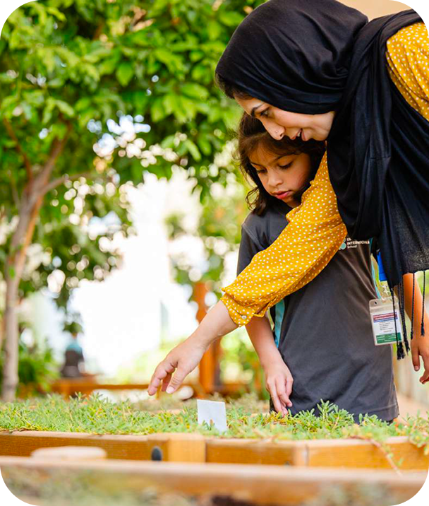 Woman and child gardening
